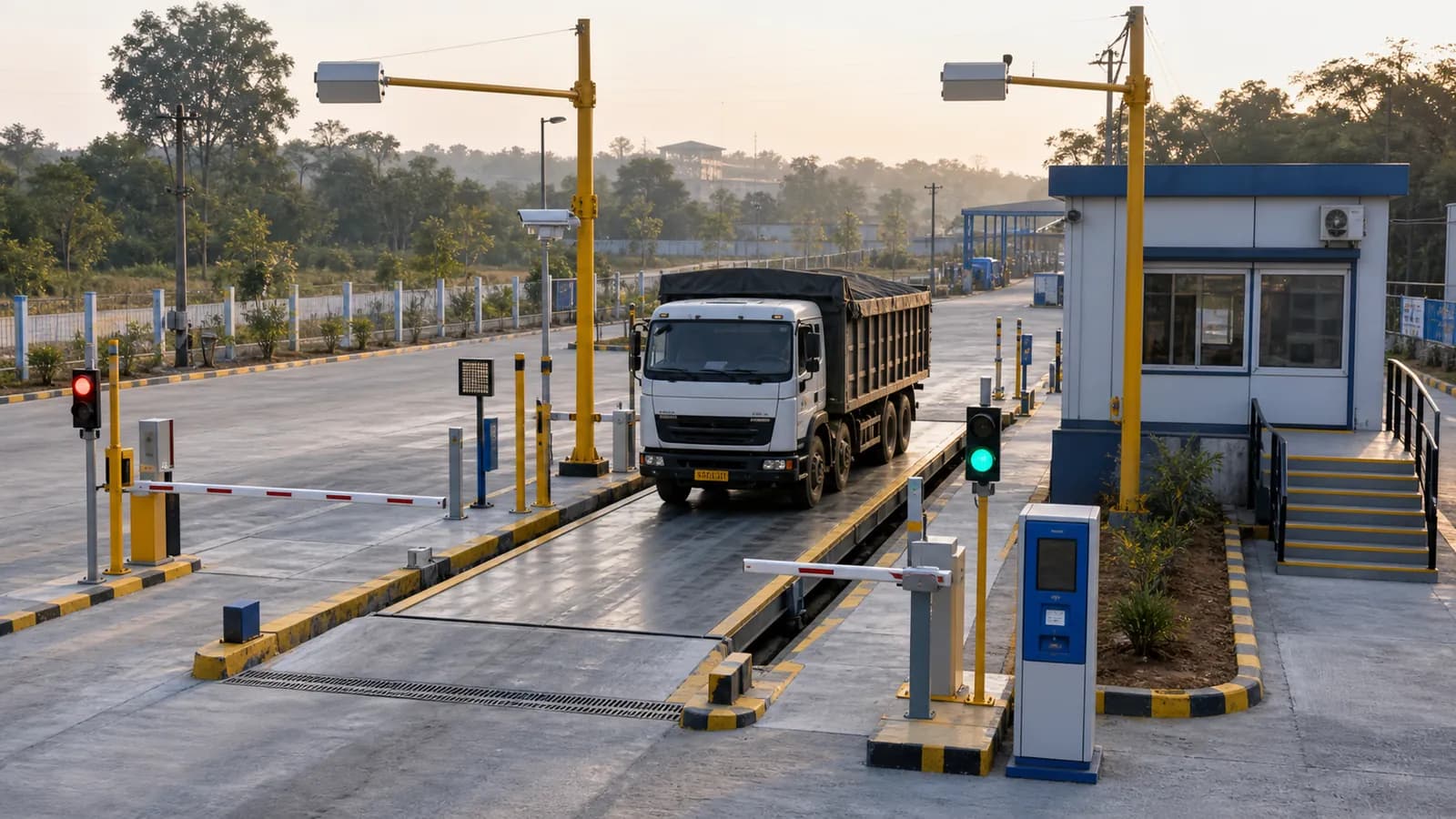 Automated truck weighbridge with RFID, barriers and traffic controls